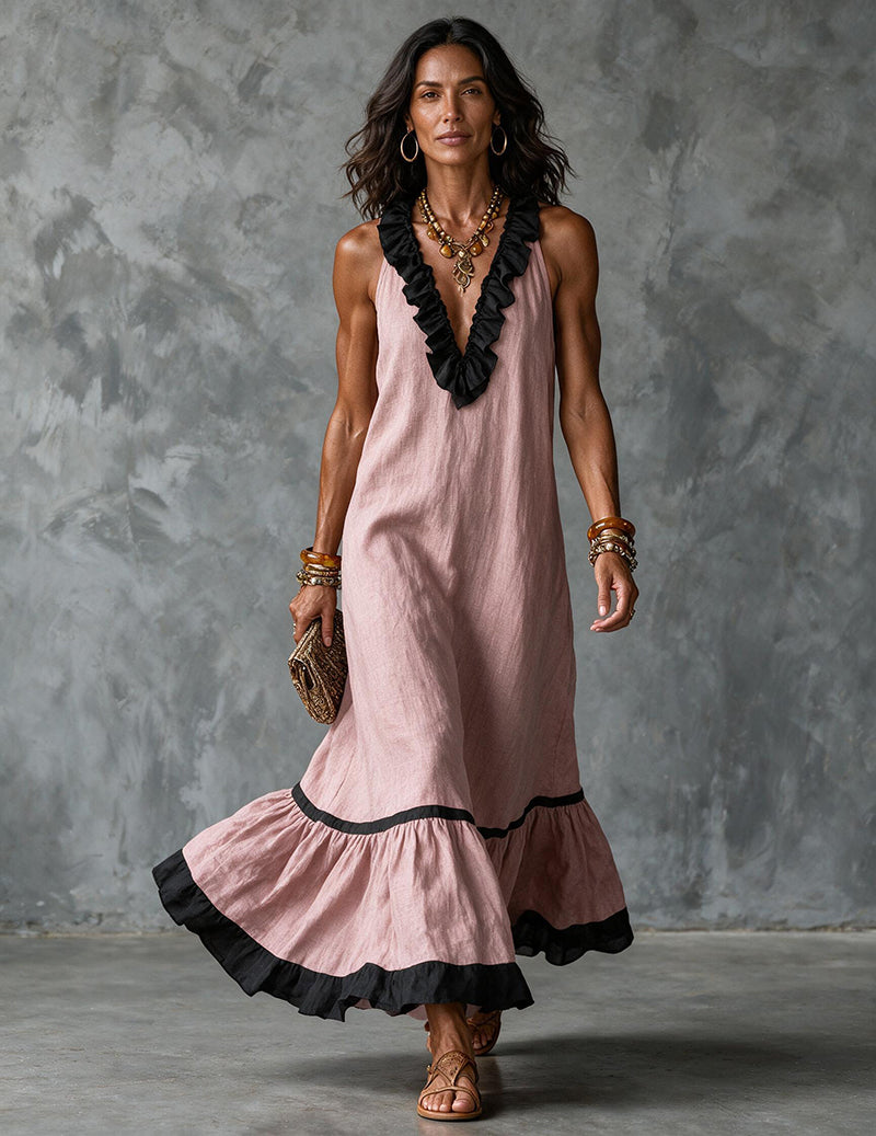 Pink cotton-linen halter maxi dress with ruffled neckline and tiered black-trim hem