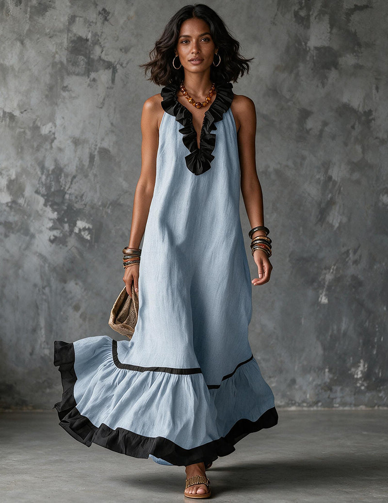 Blue cotton-linen halter maxi dress with ruffled neckline and tiered black-trim hem