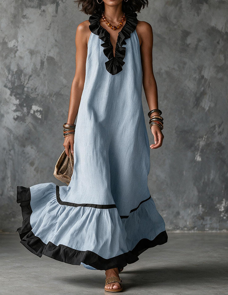 Blue cotton-linen halter maxi dress with ruffled neckline and tiered black-trim hem