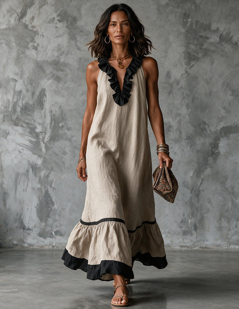 Apricot cotton-linen halter maxi dress with ruffled neckline and tiered black-trim hem