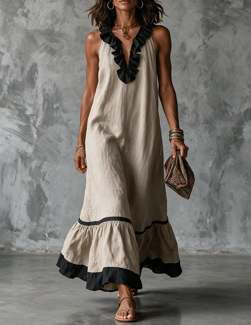 Apricot cotton-linen halter maxi dress with ruffled neckline and tiered black-trim hem