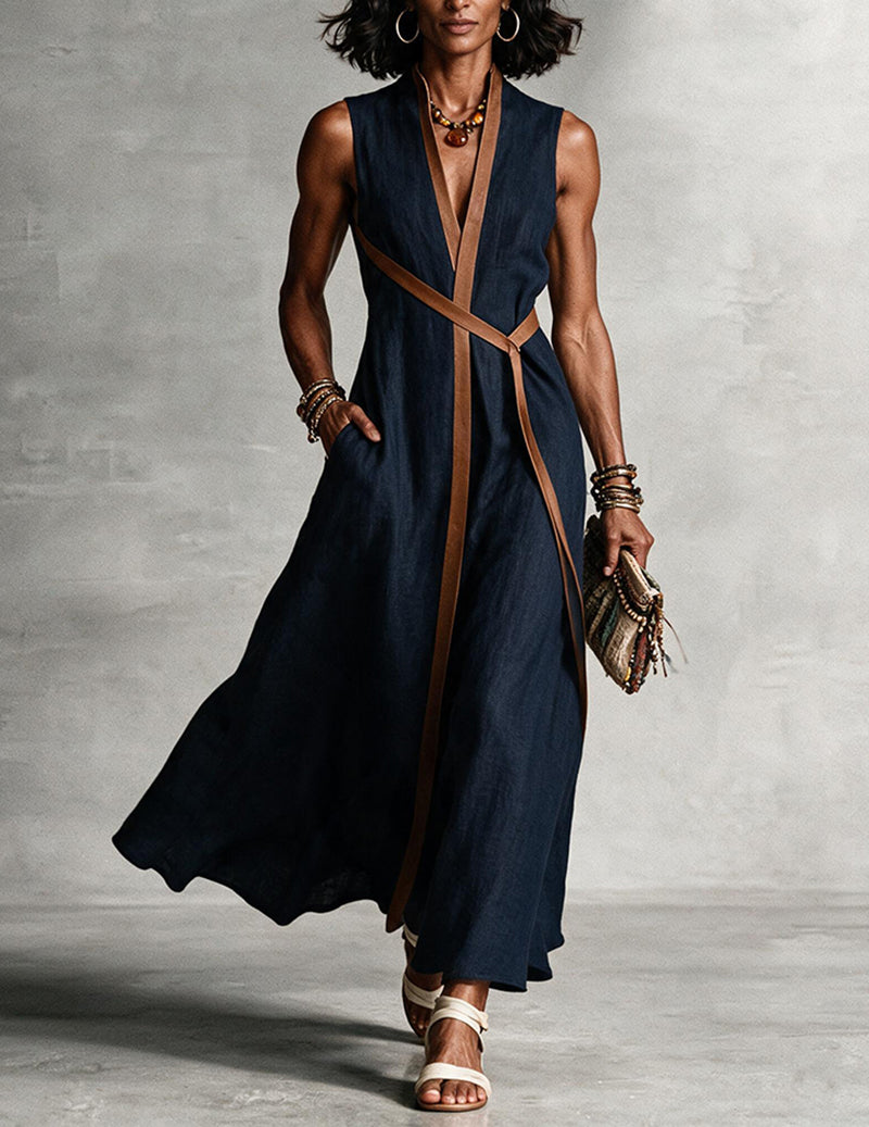 Dark navy sleeveless maxi dress with V-neck wrap front and brown tie waist trim