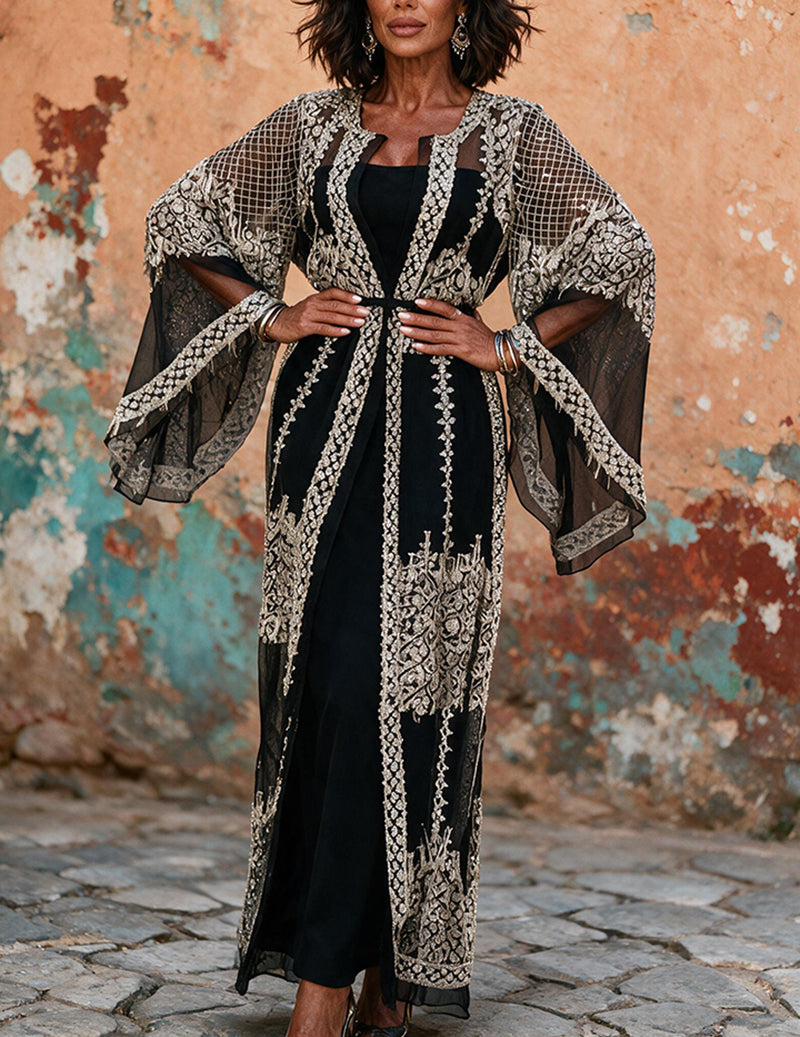 Black sequin-embellished abaya kaftan with sheer cape sleeves and vertical gold trim
