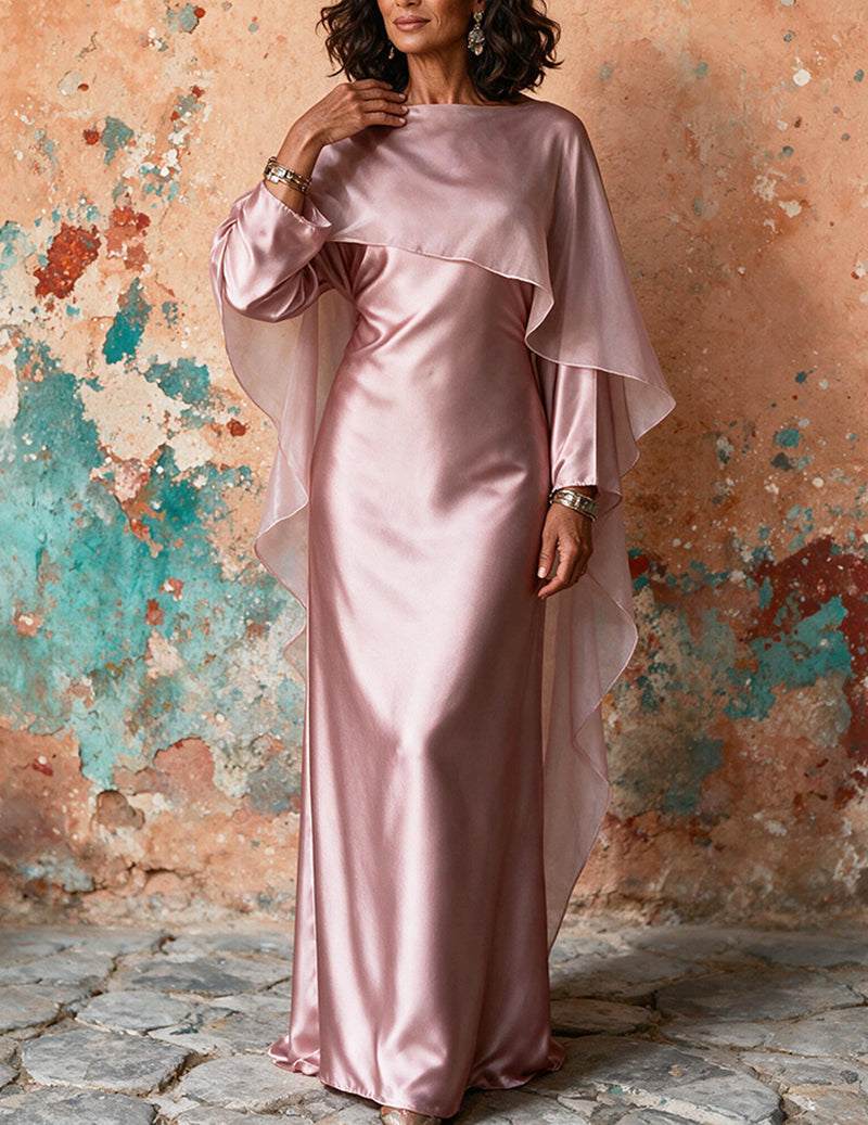 Pink satin modest dress with long sleeves and draped cape-style overlay