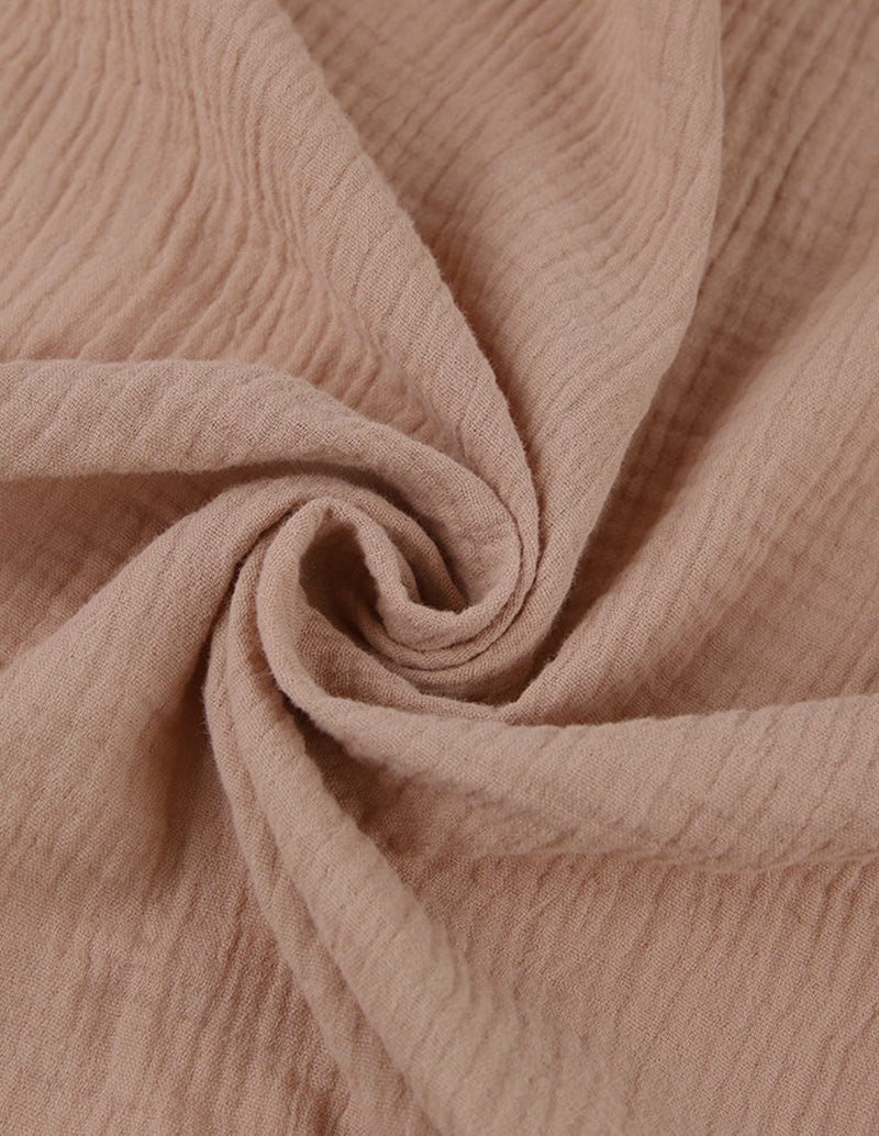 Cotton double crinkle yarn robe fabric, khaki double-crinkle texture close-up