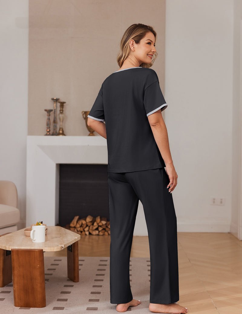 Black pajama set, short-sleeve top and straight long pants with elastic waist