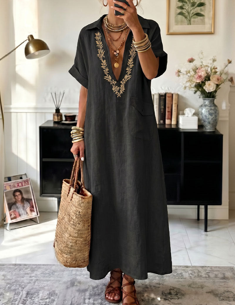 Black maxi lounge dress with V-neck embroidery, short sleeves, side pockets