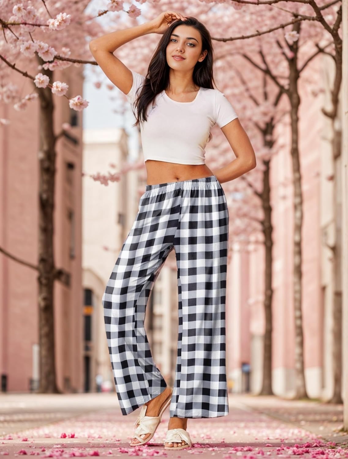 Wide-leg pajama pants in black and white buffalo plaid pattern.