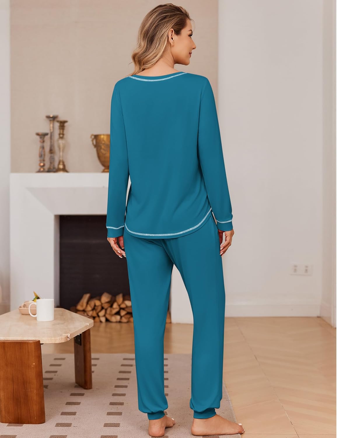 Teal long-sleeve pajama set with jogger pants and contrast piping at cuffs and hem