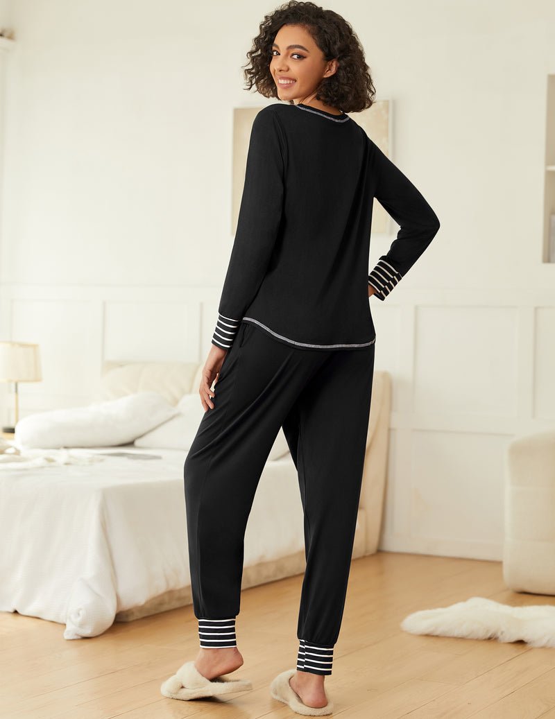 2-pack pajama set: black long-sleeve top and jogger pants with striped cuffs