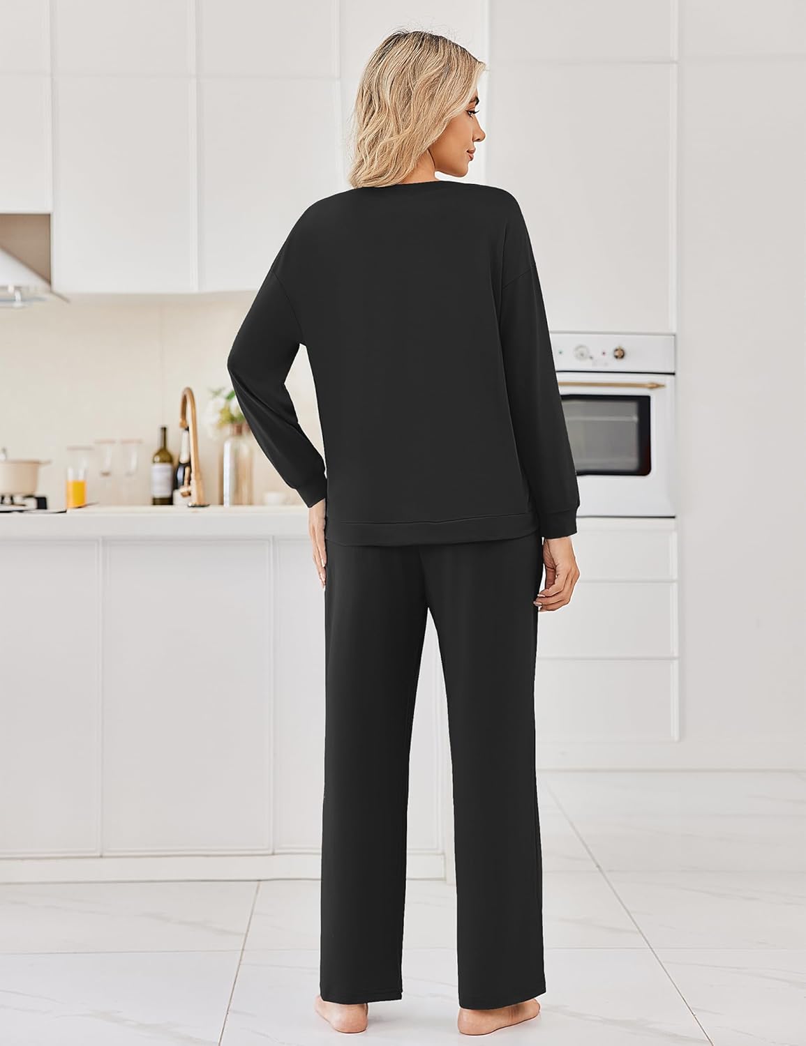 Black long-sleeve pajama set with matching pants, back view