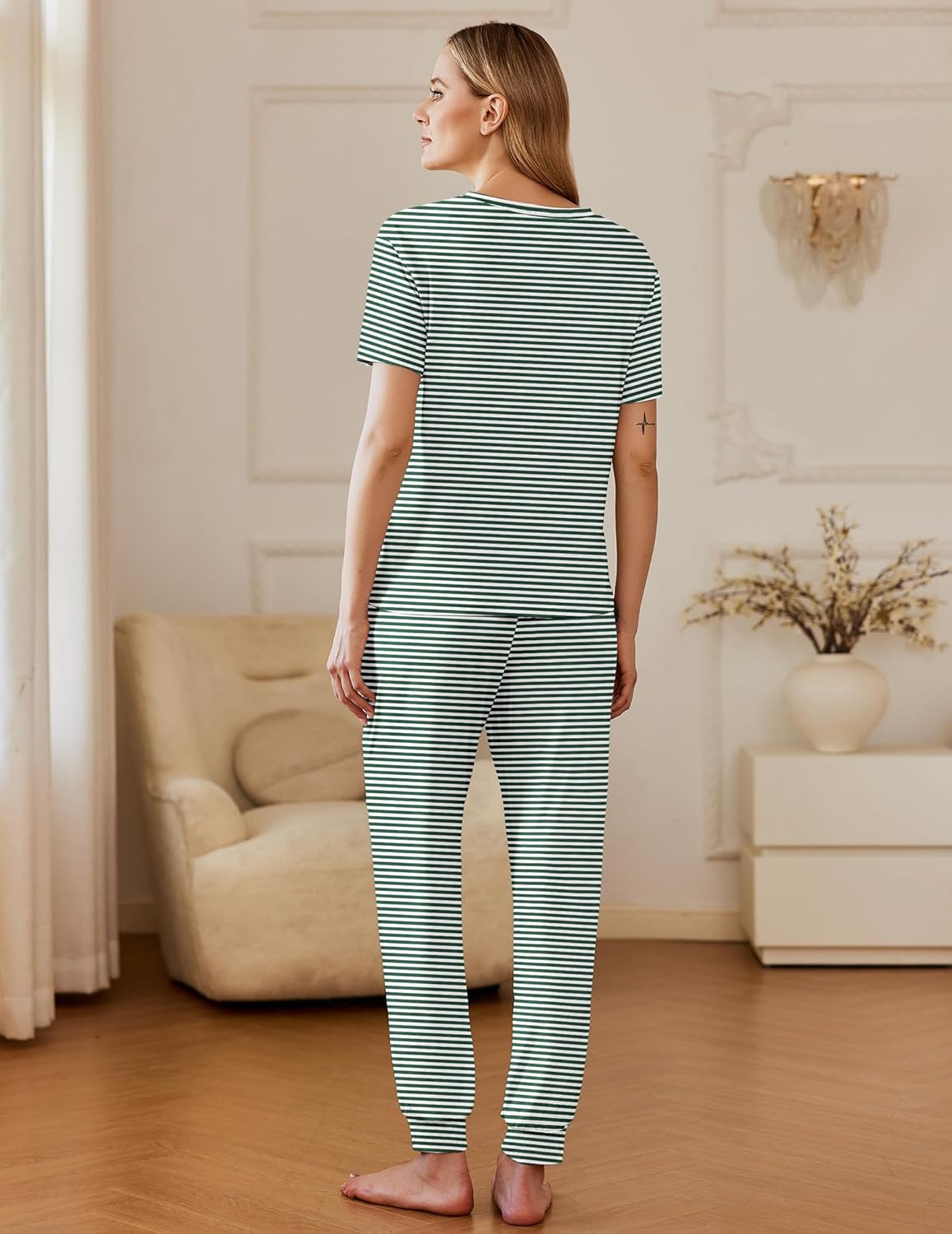 Green-and-white striped pajama set with short sleeves and long cuffed pants