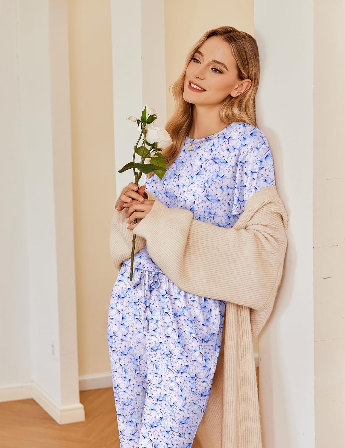 2-pack pajama set in light blue—short-sleeve floral print top with matching drawstring pants