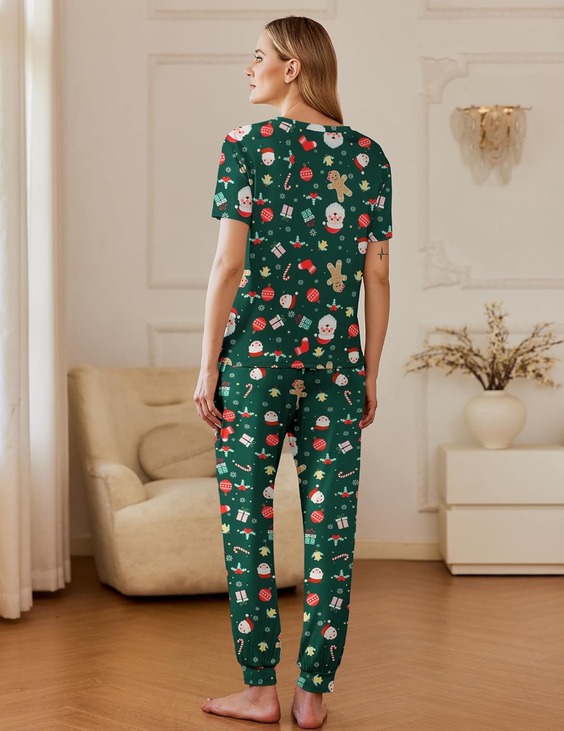 Short sleeve pajama set, dark green festive print with red/white motifs; long pants with drawstring hem