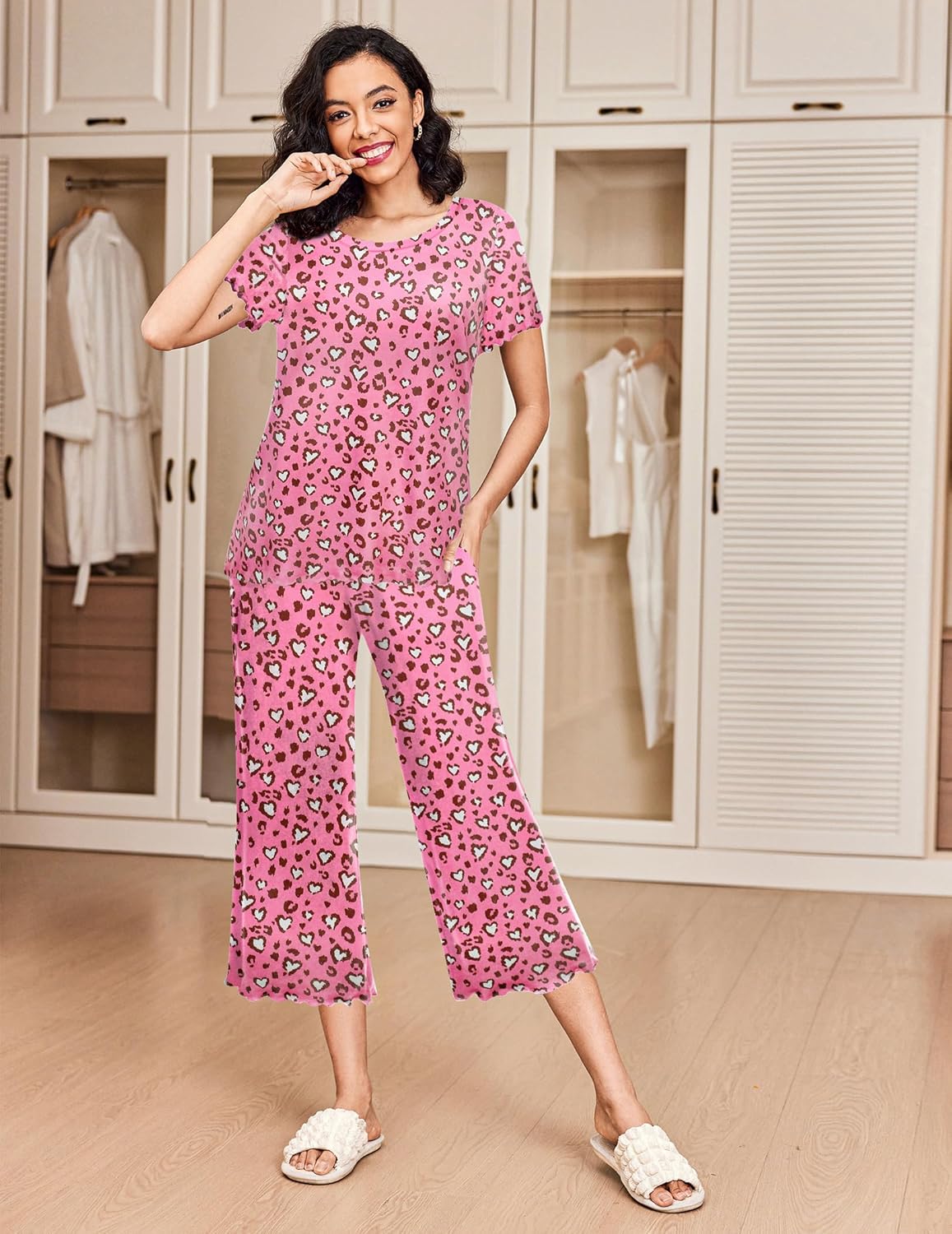 Women’s pajama set in pink floral short-sleeve top and cropped matching pants