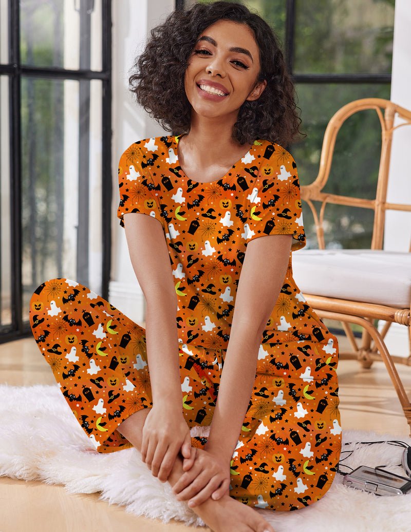Orange cat-themed pajama set: V-neck top and long pants with drawstring