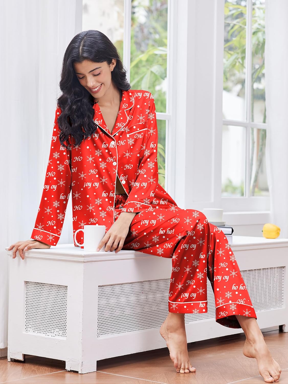 Red satin button-front pajama top and matching long trousers, festive pattern