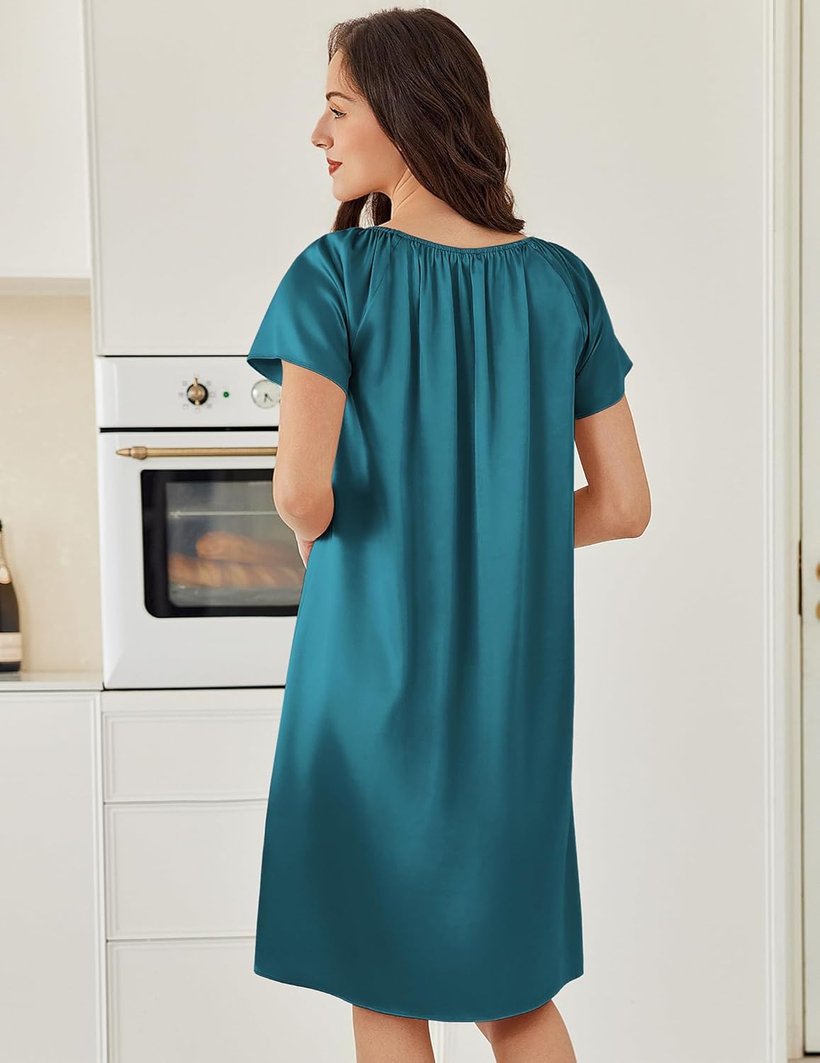 Silk nightgown back view, teal blue loose pleated dress, short sleeves