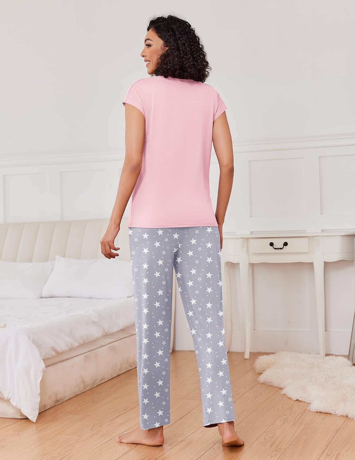 Cap-sleeve pajama set, back view: pink top and star-print gray pants