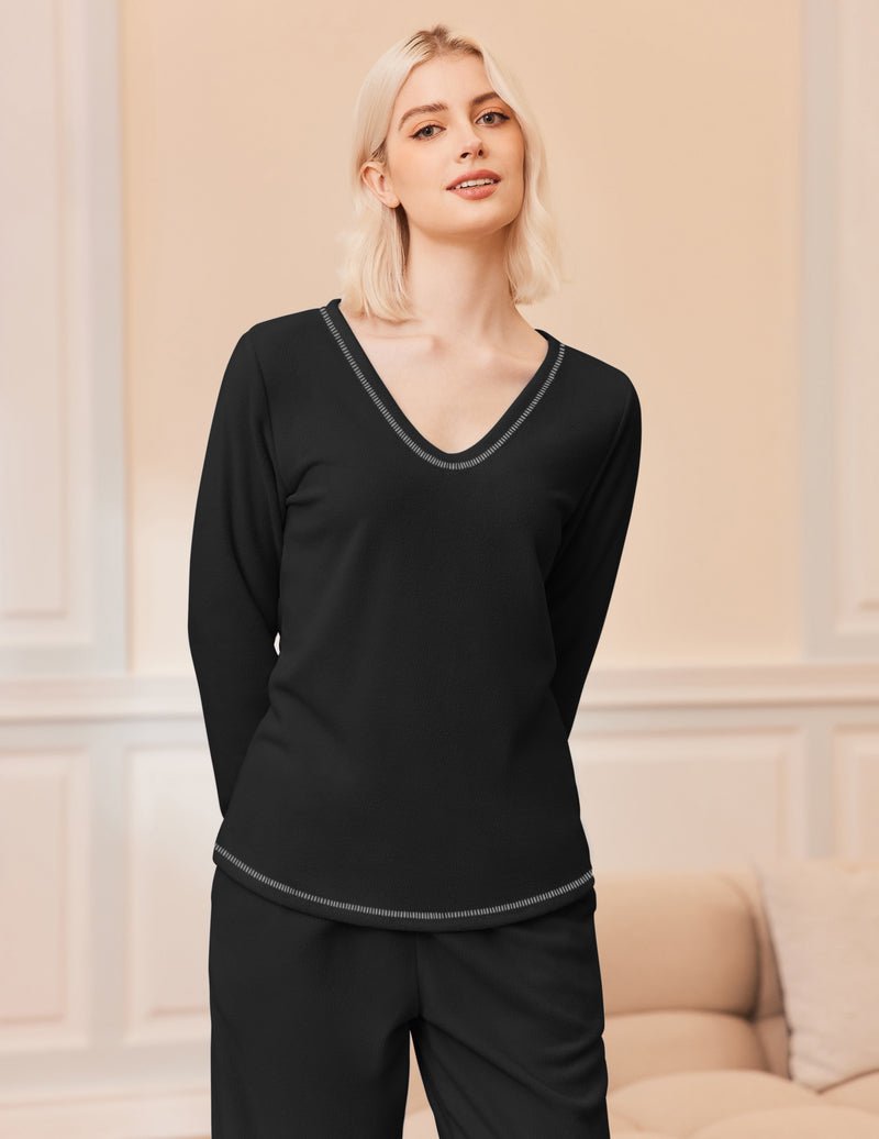 Black fuzzy long-sleeve V-neck top with contrast trim; matching lounge pants