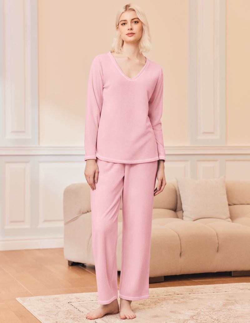 Pink fuzzy lounge set: long-sleeve V-neck top and matching wide-leg pants
