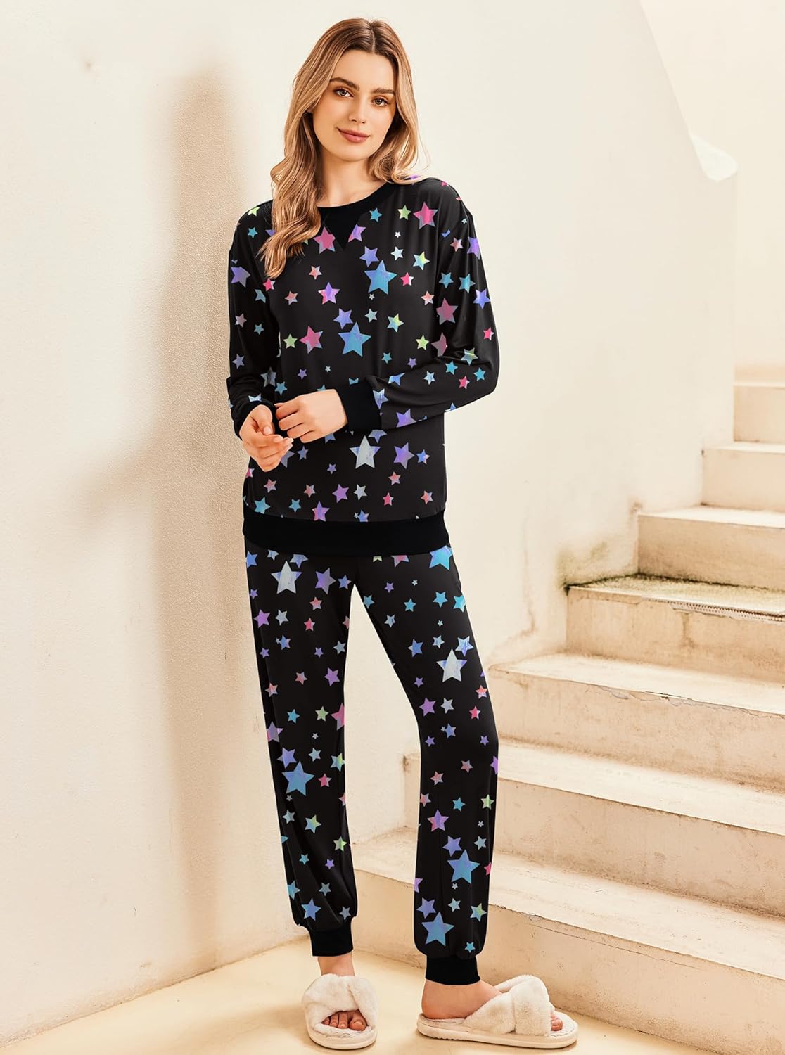 Black starry pajama set with long-sleeve top and tapered jogger pants