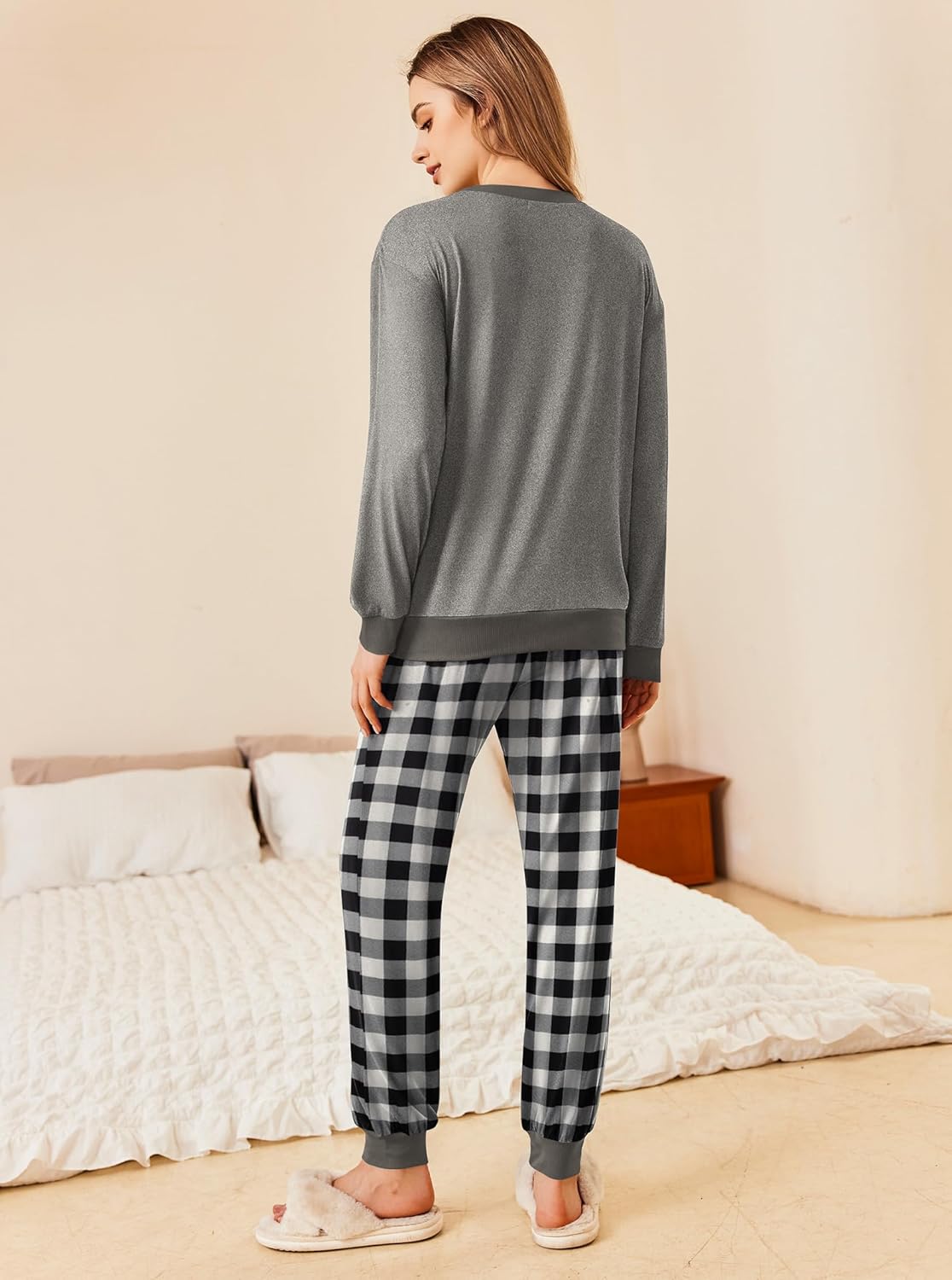Back view: dark grey pajama top with black-and-white plaid jogger pants