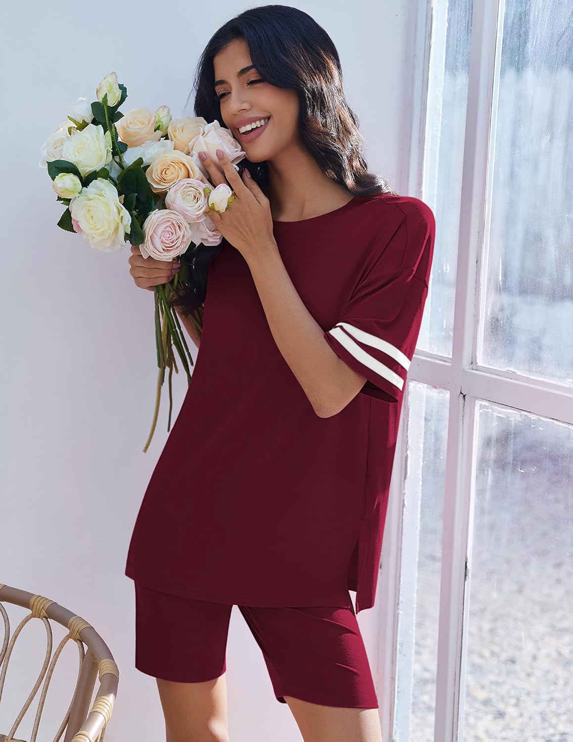 Burgundy lounge set with striped sleeve cuffs and knee-length matching shorts