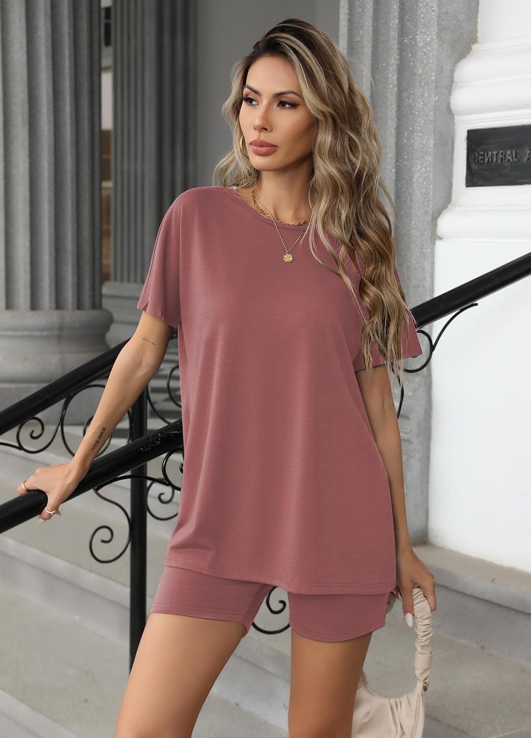 Two-piece lounge set with short-sleeve top and matching shorts, dusty mauve pink.