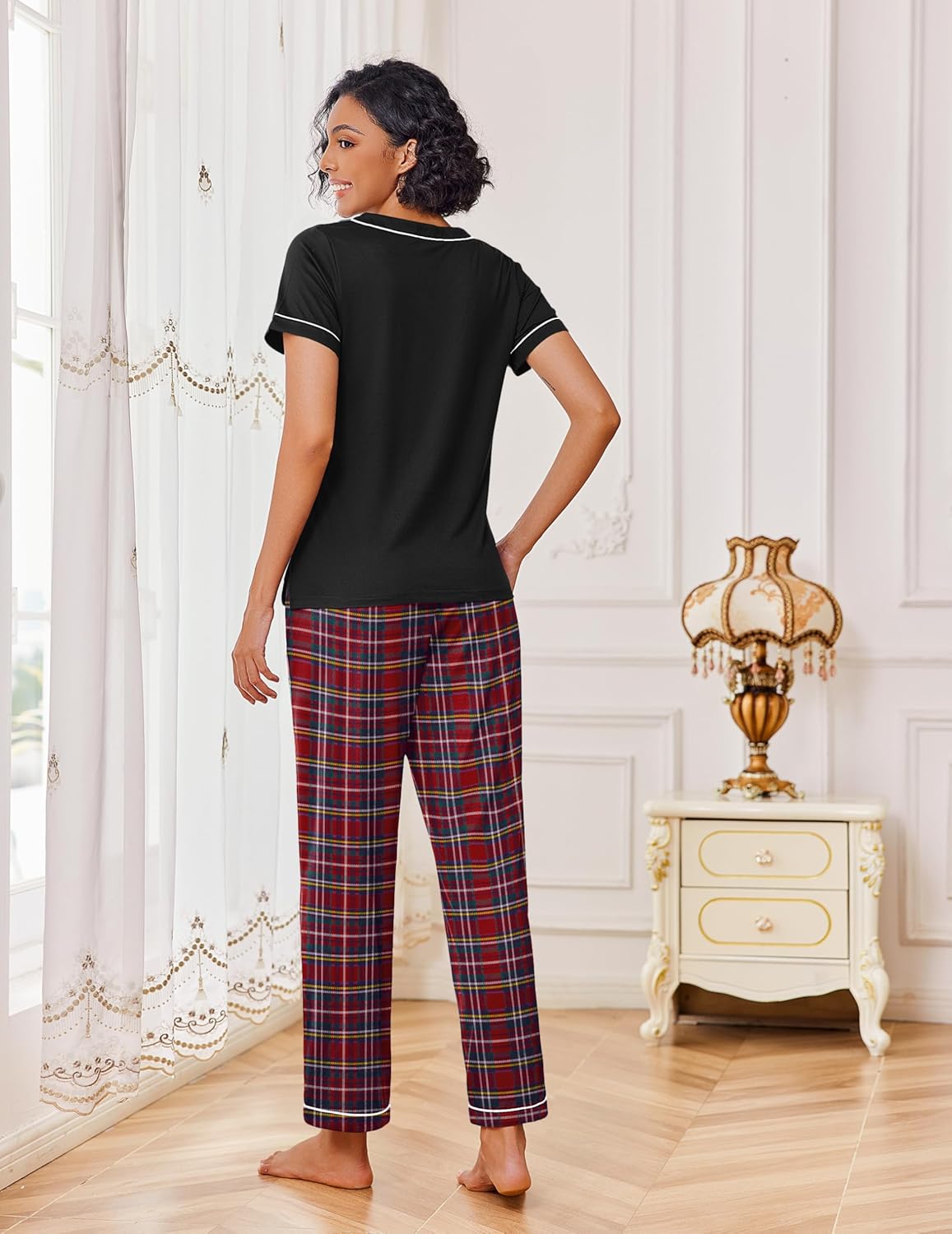 Red plaid lounge set, back view: black T-shirt with contrast neckline and plaid pants