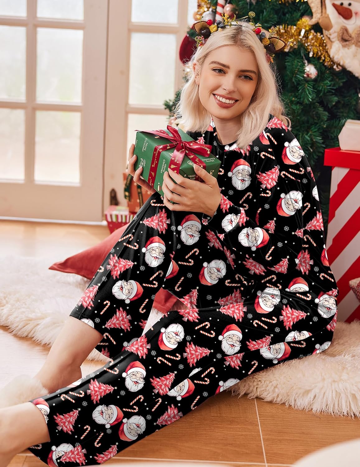 2-piece holiday lounge set: black long-sleeve top and printed pants with drawstring