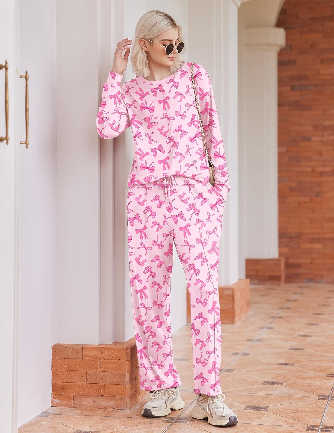 Pink Bow Knot pajama set, front view: long-sleeve top with rounded neckline and drawstring pants