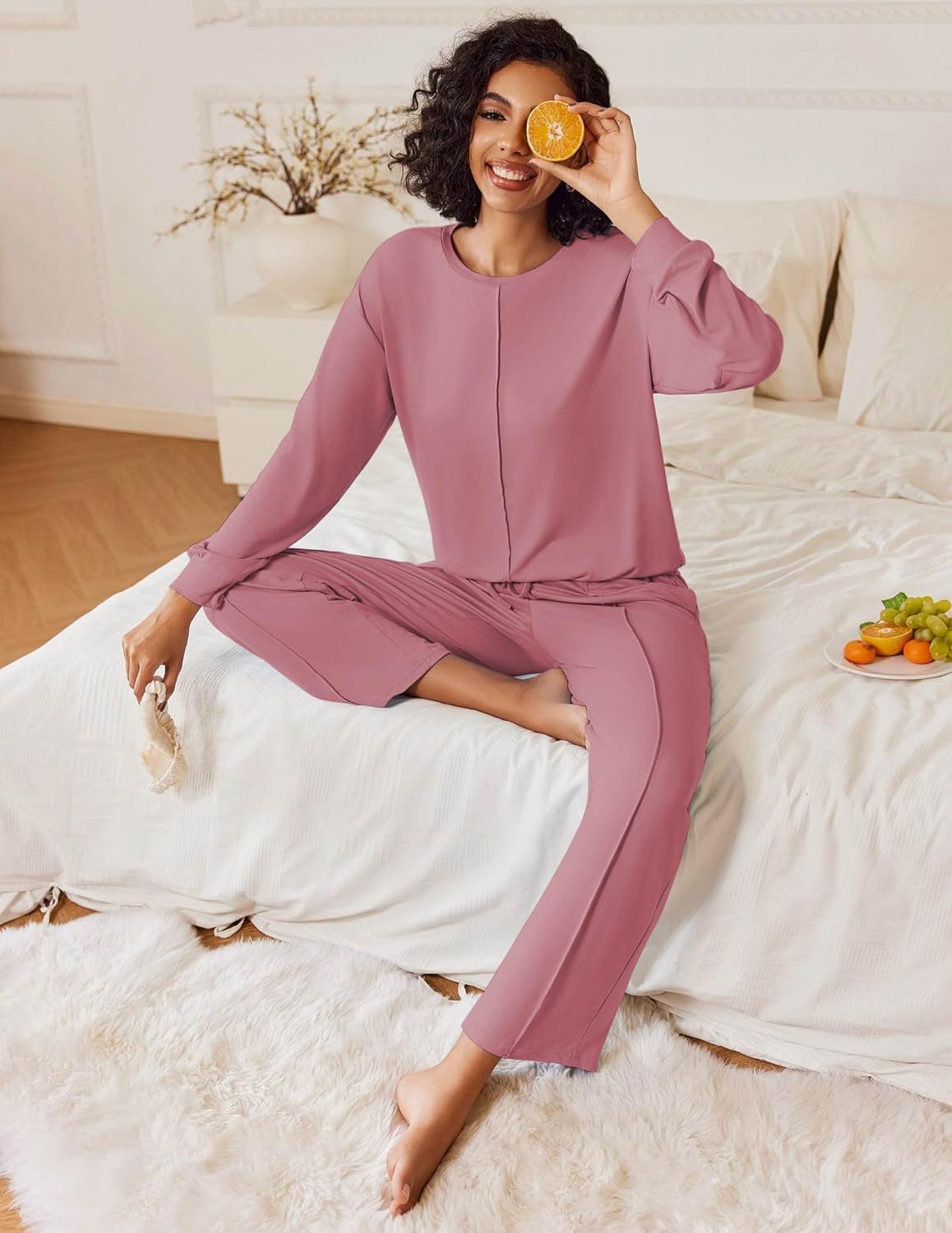 Pink 2-piece lounge set with long sleeves and matching relaxed wide-leg pants