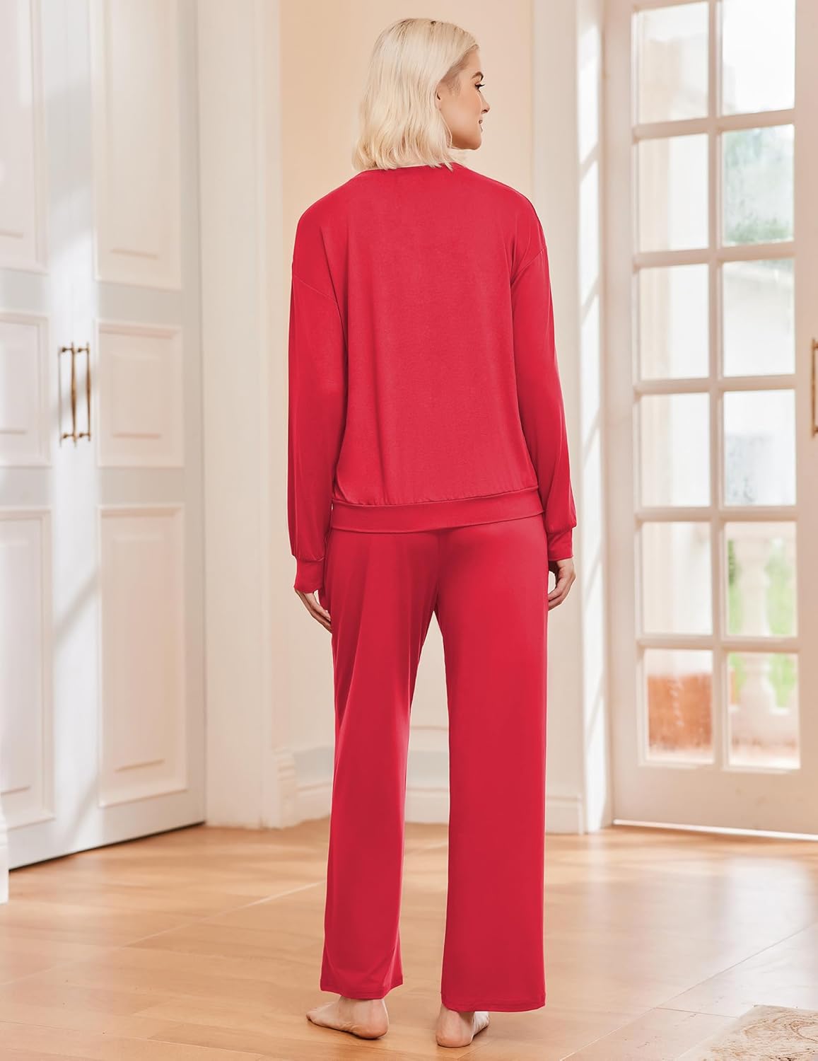 Red lounge set from back view: long-sleeve top and straight pants
