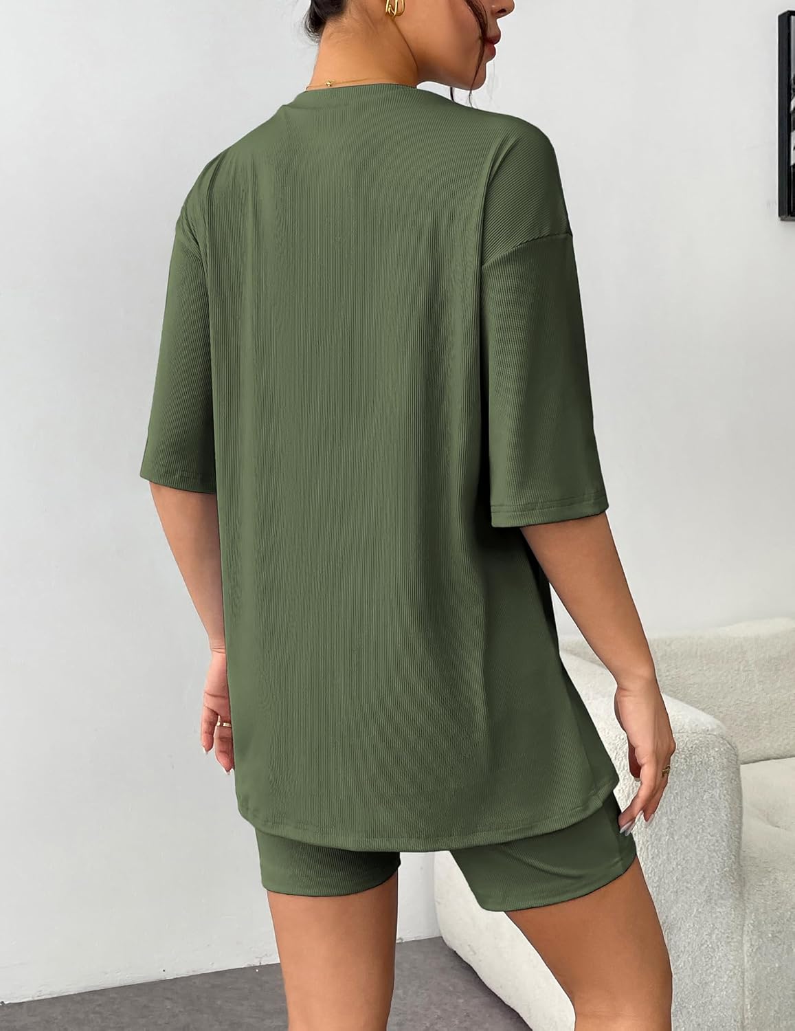 Ribbed knit lounge set in dark green from back: T-shirt and biker shorts