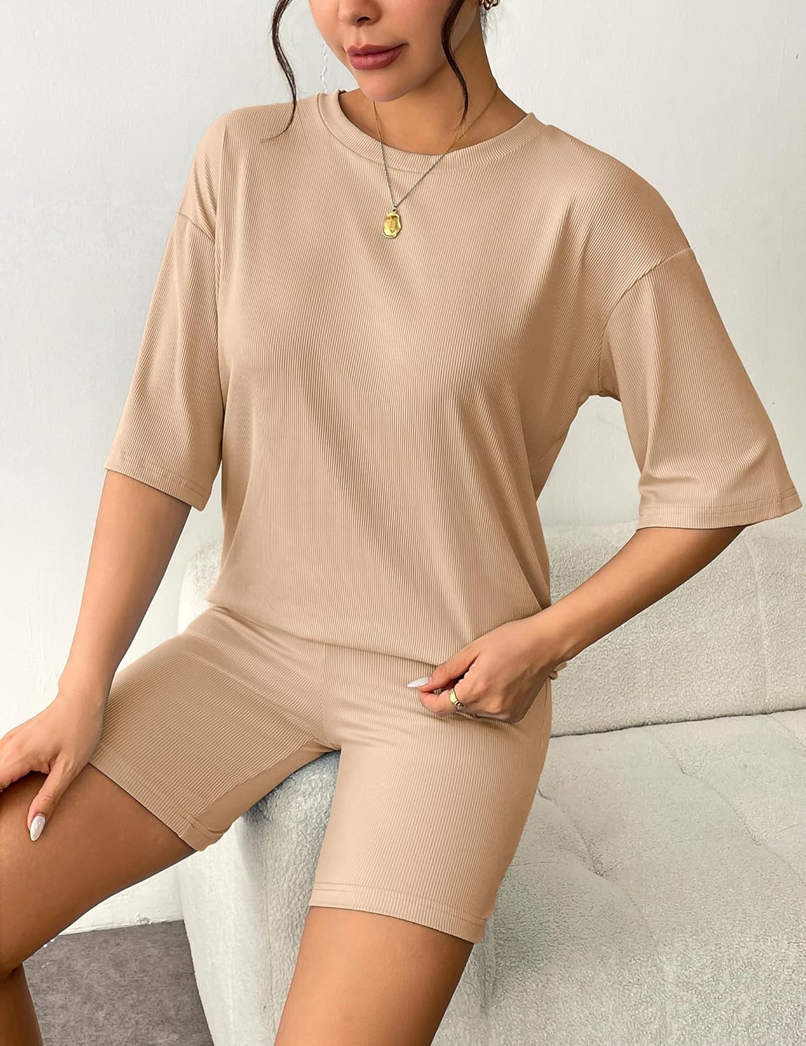 Beige ribbed knit lounge set: relaxed T-shirt and matching biker shorts