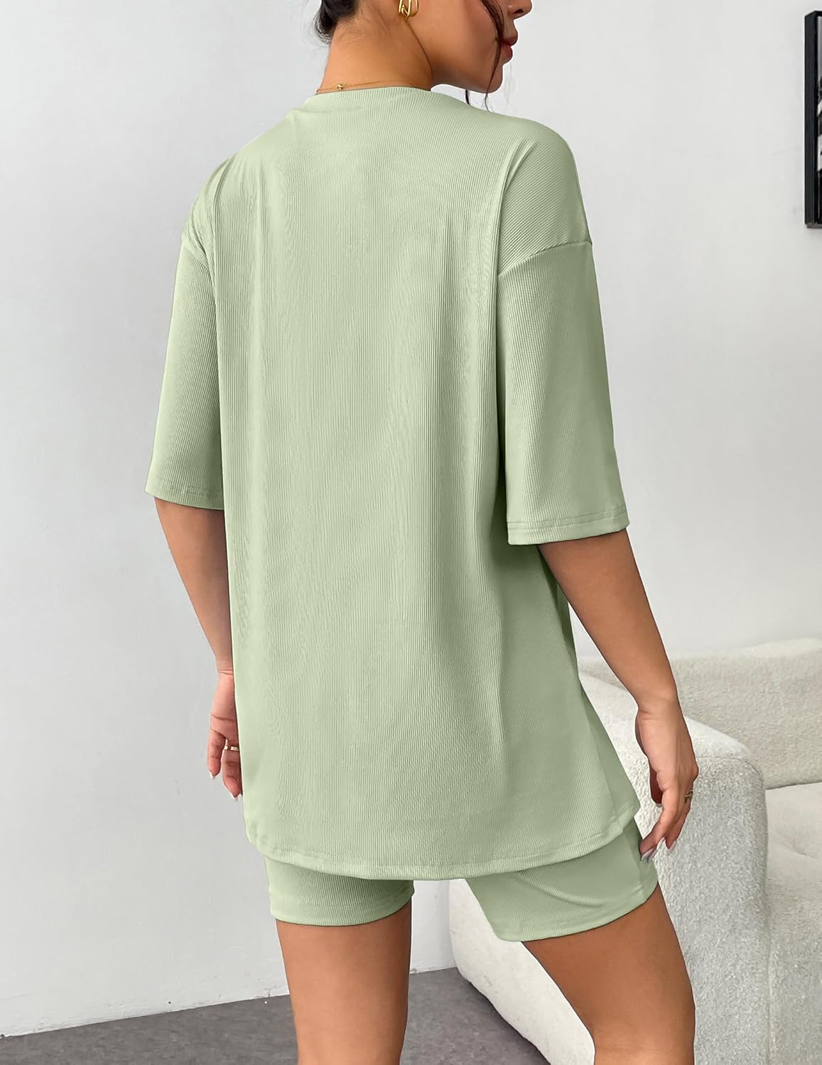 Light green ribbed knit lounge set with short-sleeve T-shirt and matching shorts, back view