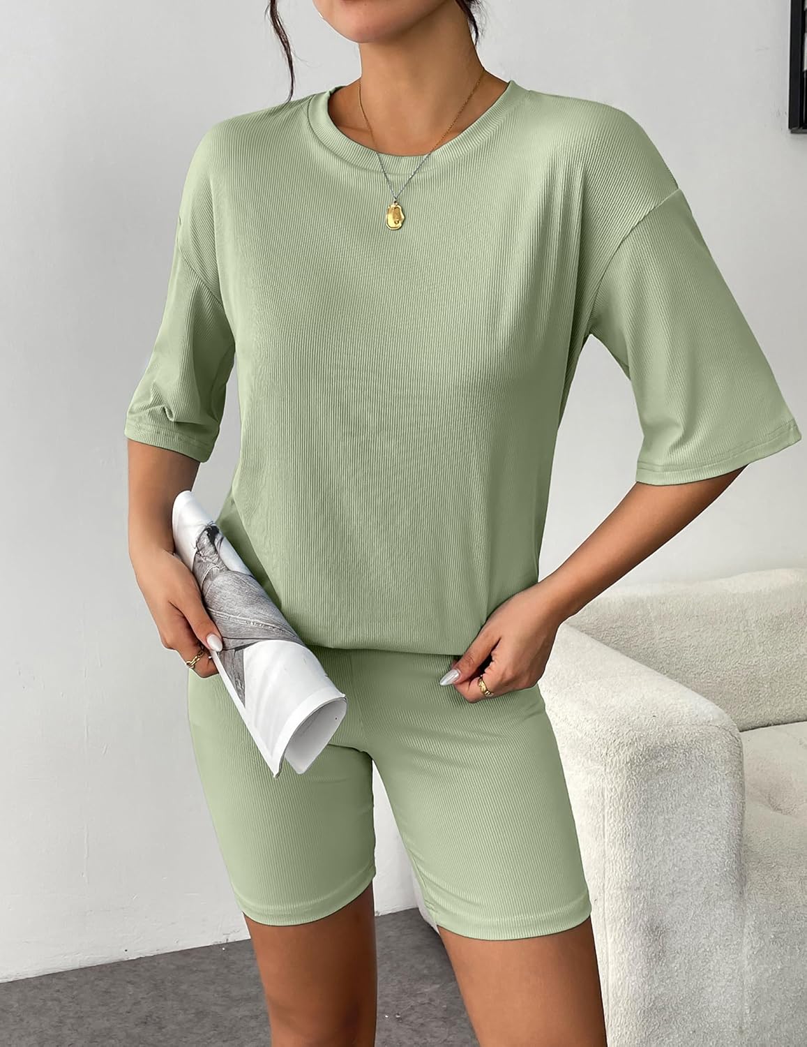 Light green ribbed knit lounge set with short-sleeve T-shirt and matching bike shorts, front view