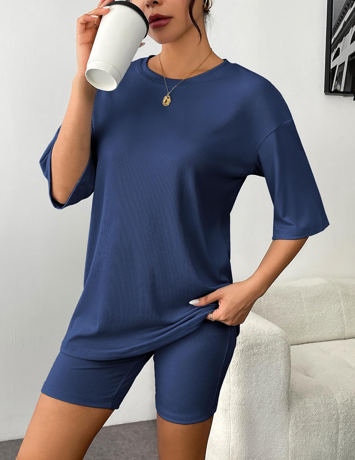 Navy blue ribbed knit lounge set with short-sleeve T-shirt and matching shorts, drinking bottle