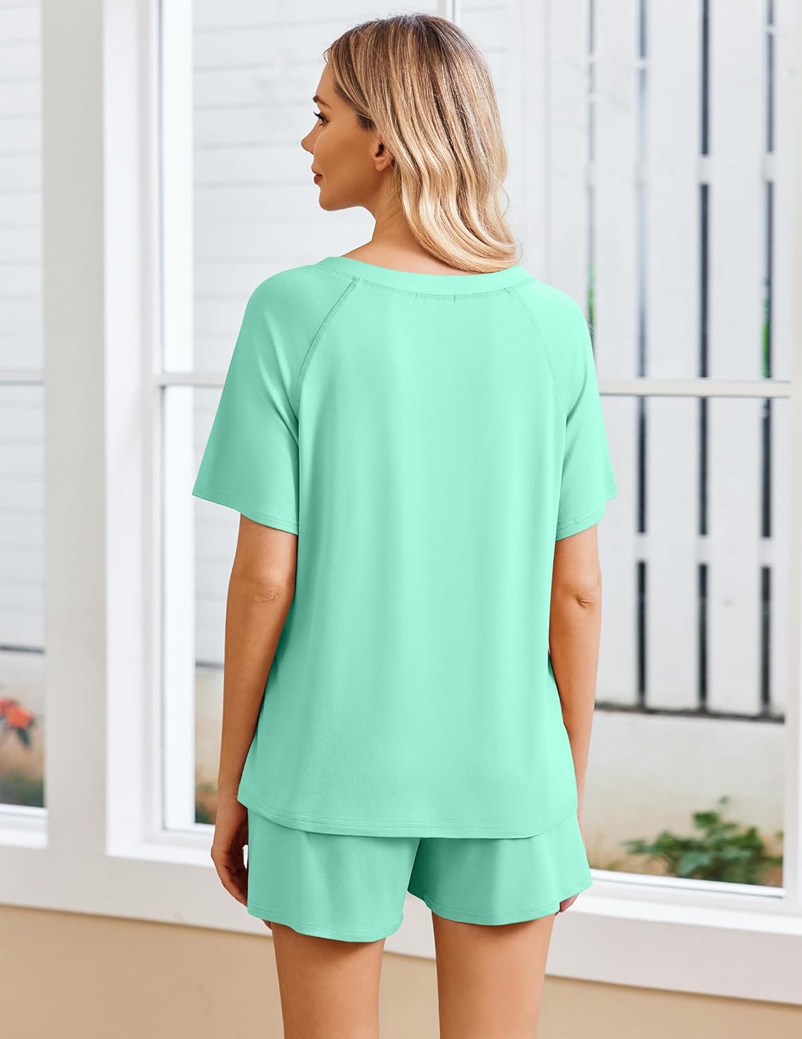 Light Green lounge set: back view of short-sleeve top with matching pocket shorts