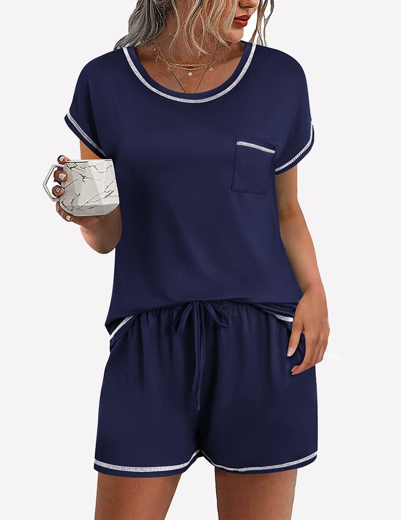 Navy blue loungewear set with short-sleeve top and matching shorts with drawstring.