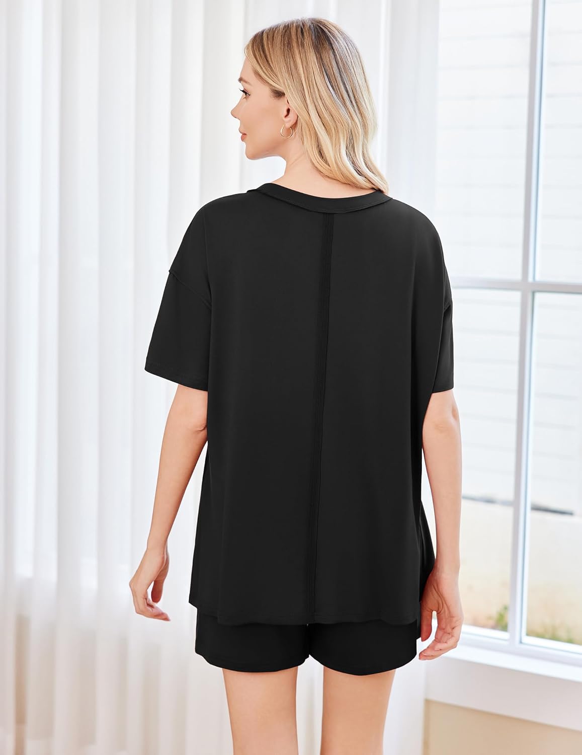 Black short-sleeve pajama set with matching shorts, scoop neck, back view