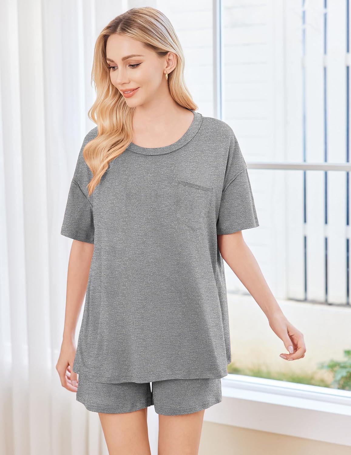 Grey short-sleeve pajama set with chest pocket and matching shorts, front view
