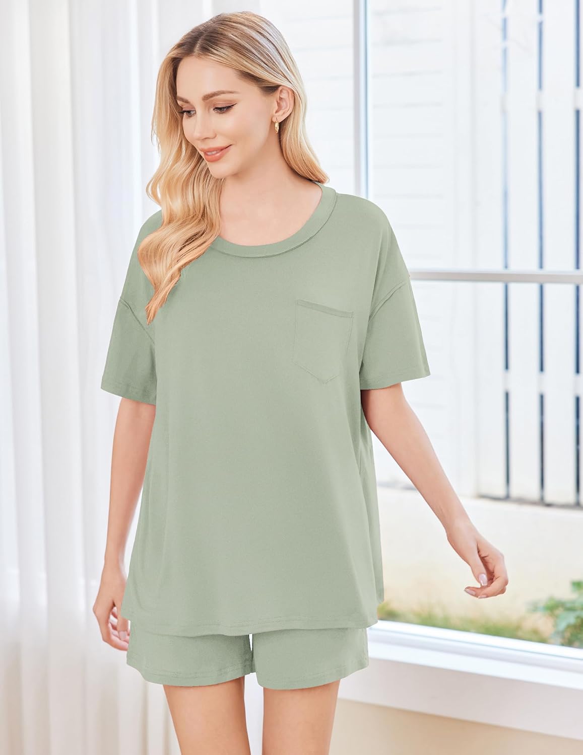 Olive green short-sleeve pajama set with chest pocket and matching shorts, front view