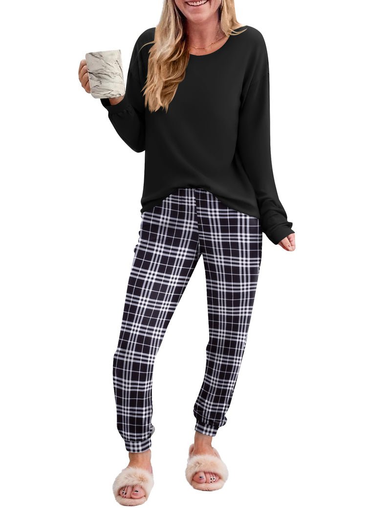 2-piece plaid pajama set with black long-sleeve top and black/white plaid pants