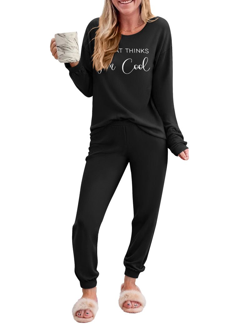 Black 2-piece plaid pajama set with long sleeves and cuffed jogger pants