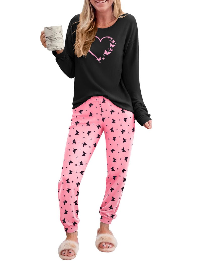Black long-sleeve top with pink heart-and-star print pants lounge set