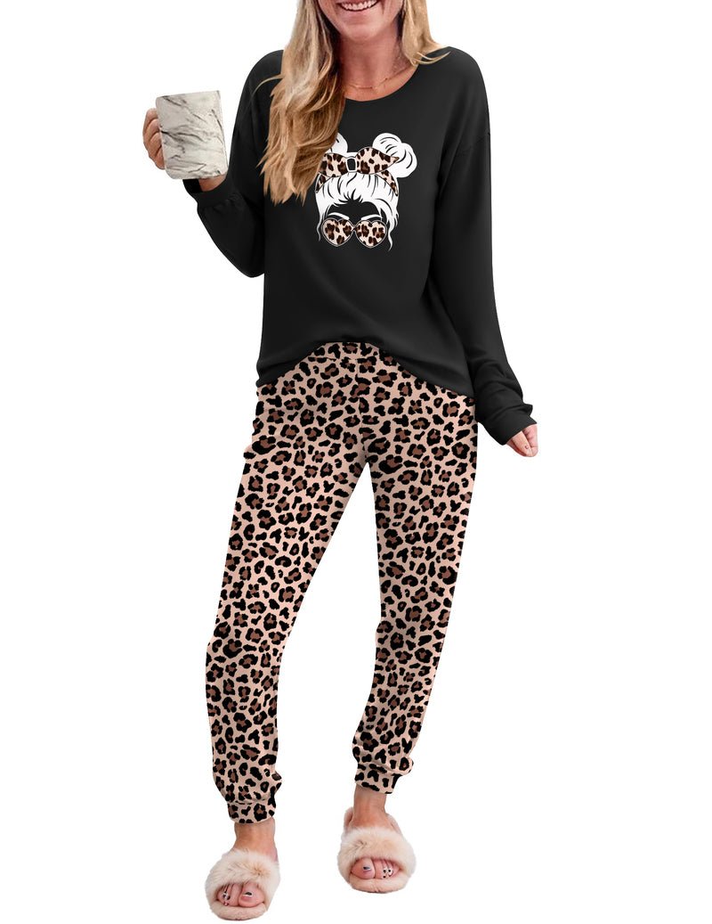 Black long-sleeve pajama top with leopard-girl graphic and leopard-print joggers