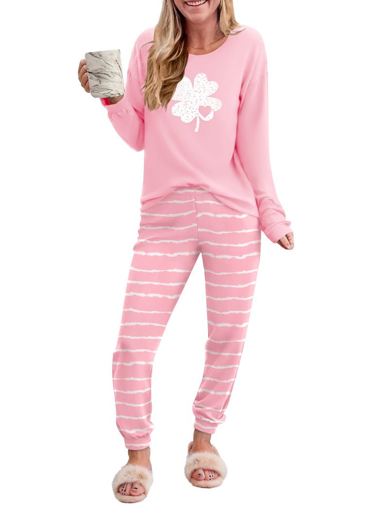 Pink long-sleeve pajama top with clover heart graphic and striped pants set