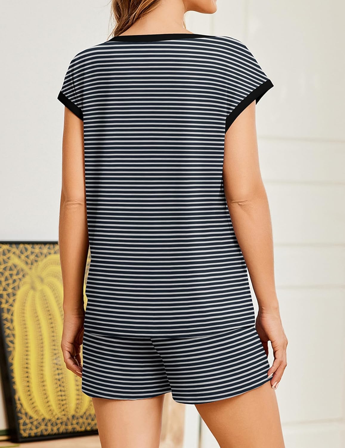 Back view: navy and white striped short-sleeve pajama top and matching shorts set